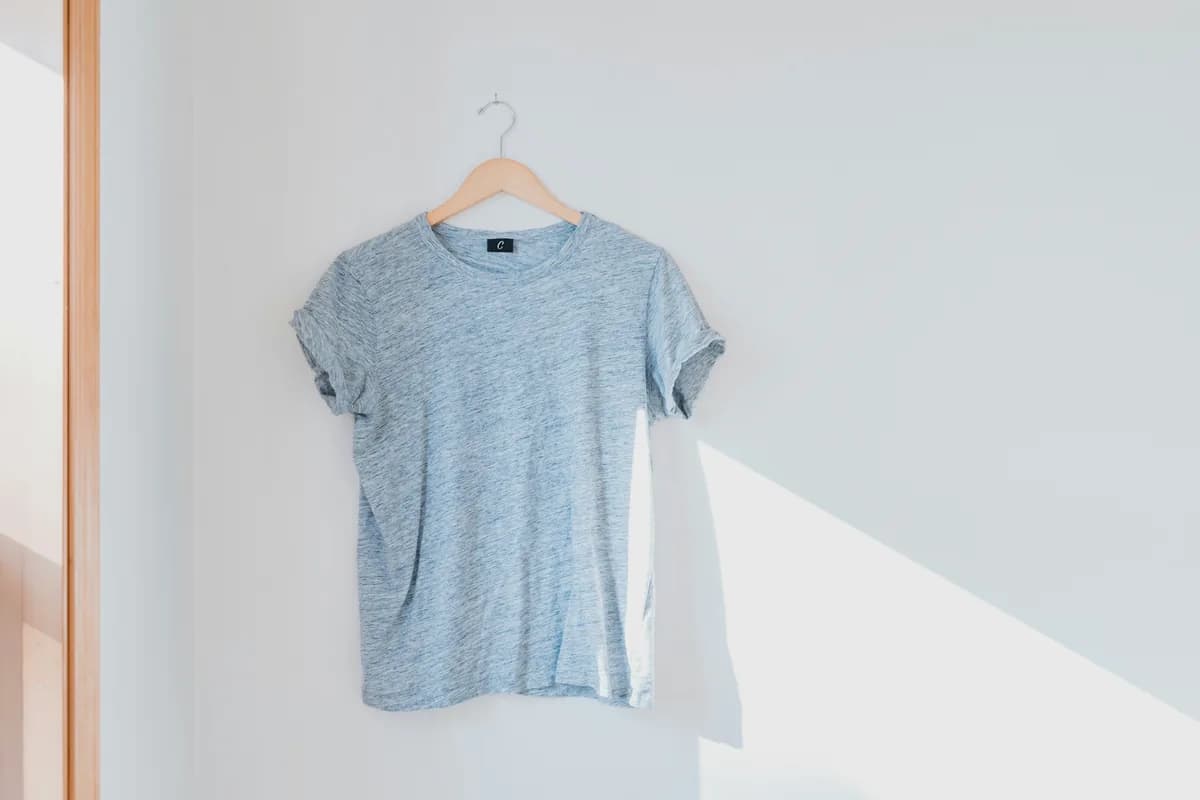 Original photo: heather blue tee on a hanger