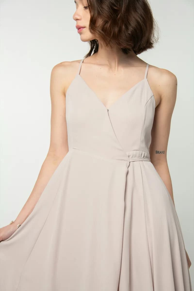 Blush slip dress, cropped above the hem